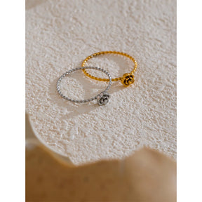 Anel torcido banhado a ouro 18k