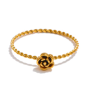 Anel torcido banhado a ouro 18k